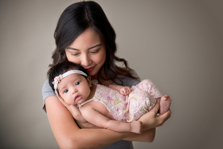 San Diego Newborn photographer. 5 weeks old baby. Parent posing