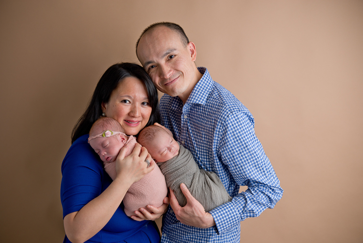 San Diego Newborn Photographer San Diego Newborn Photographer. Parents posing with twins