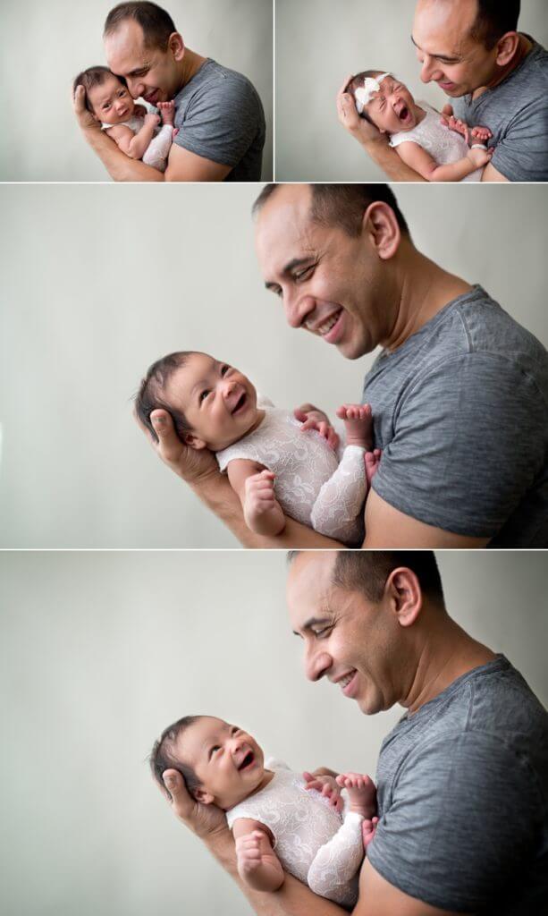 angela beransky photography san diego newborn baby photographer newborn baby with dad parents posing smiling baby dad holding the baby