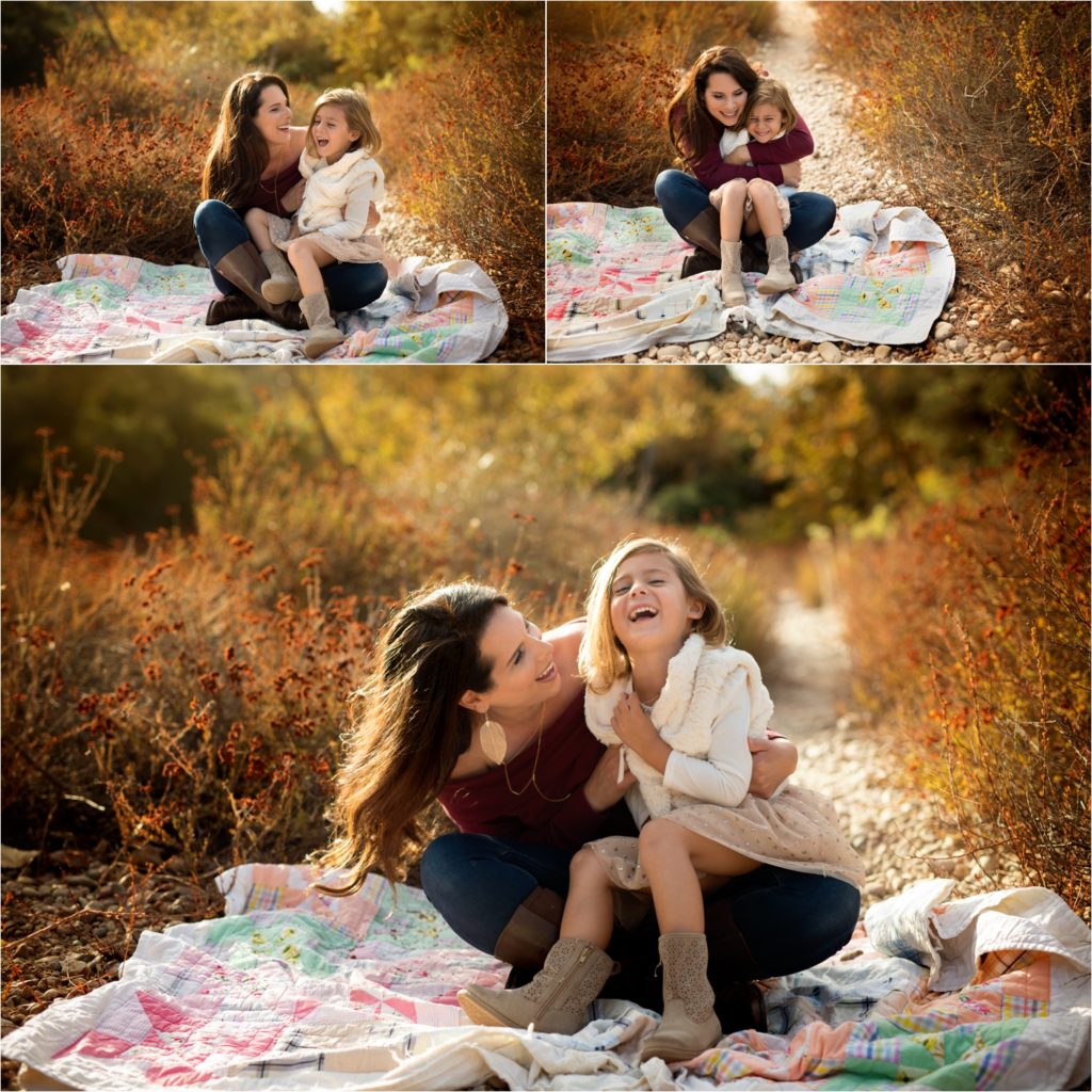 Family Photography in San Diego, San Diego Newborn Photographer. Marian Bear park. Family of three. Mommy and daughter laughing. Mommy and daughter hugging.