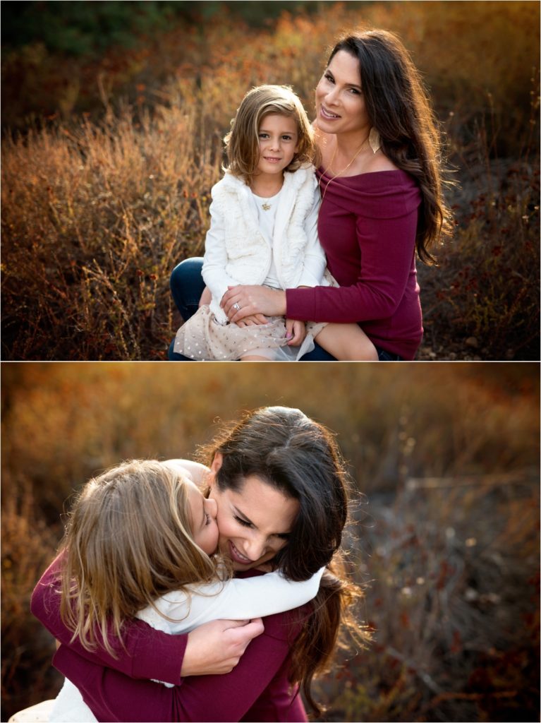 San Diego Family photographer, San Diego Newborn Photographer. Marian Bear park. Family of three.Mother and daughter looking to te camera. Mother and daughter hugging.