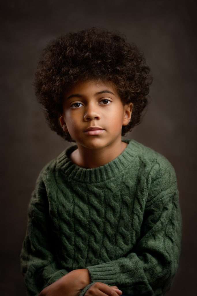 fine art portraits of a african american boy with pufffy hair