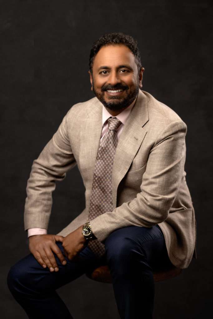 business headshot of a man in beige suit by san diego headshot photographer